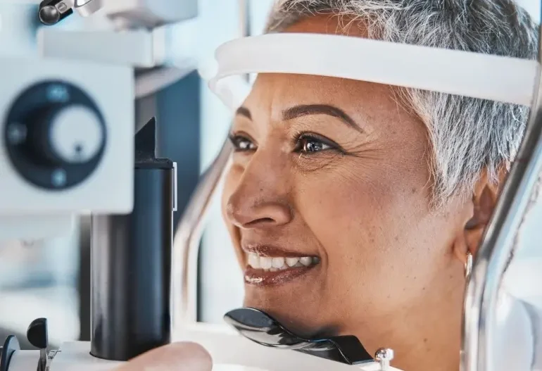 senior woman having eye exam