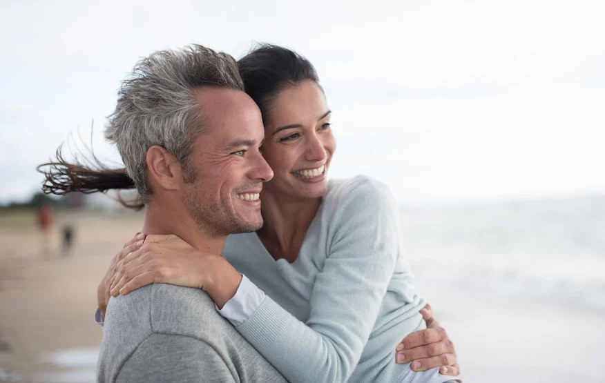 happy couple at the beach