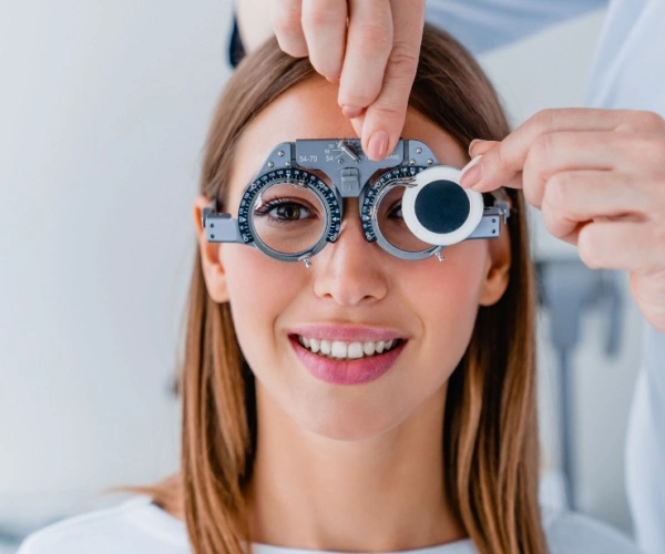 young woman having her eyes evaluated